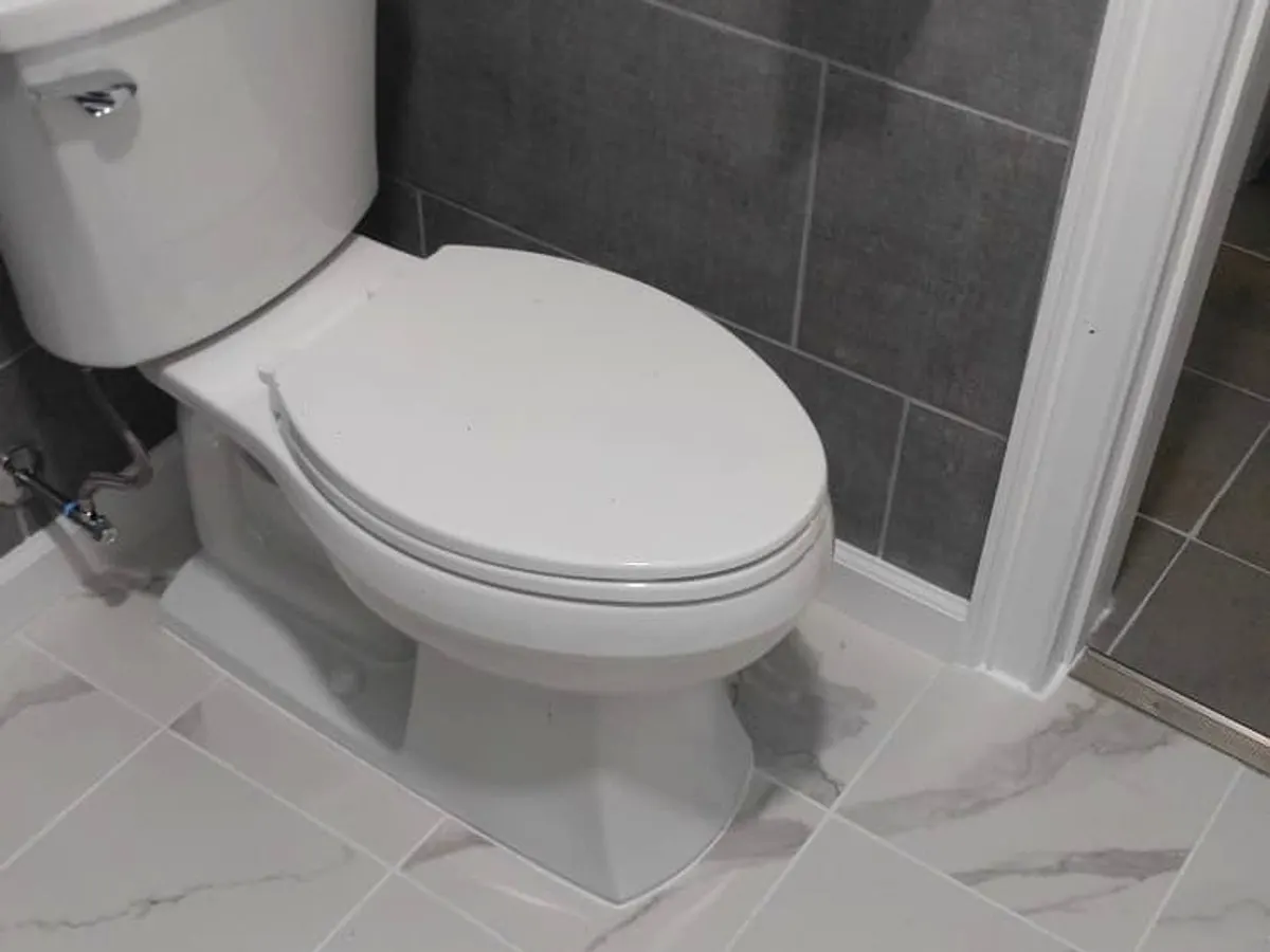 Bathroom remodel with new tile and fixtures